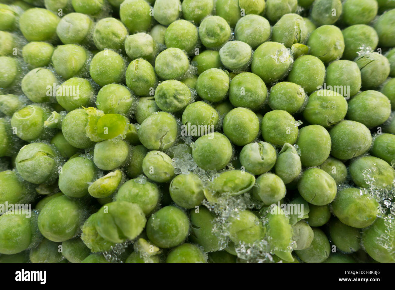 frozen peas with ice crystals still life Stock Photo