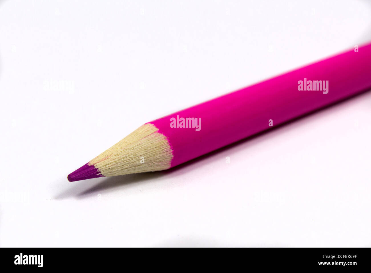 Pink pencil white background Stock Photo