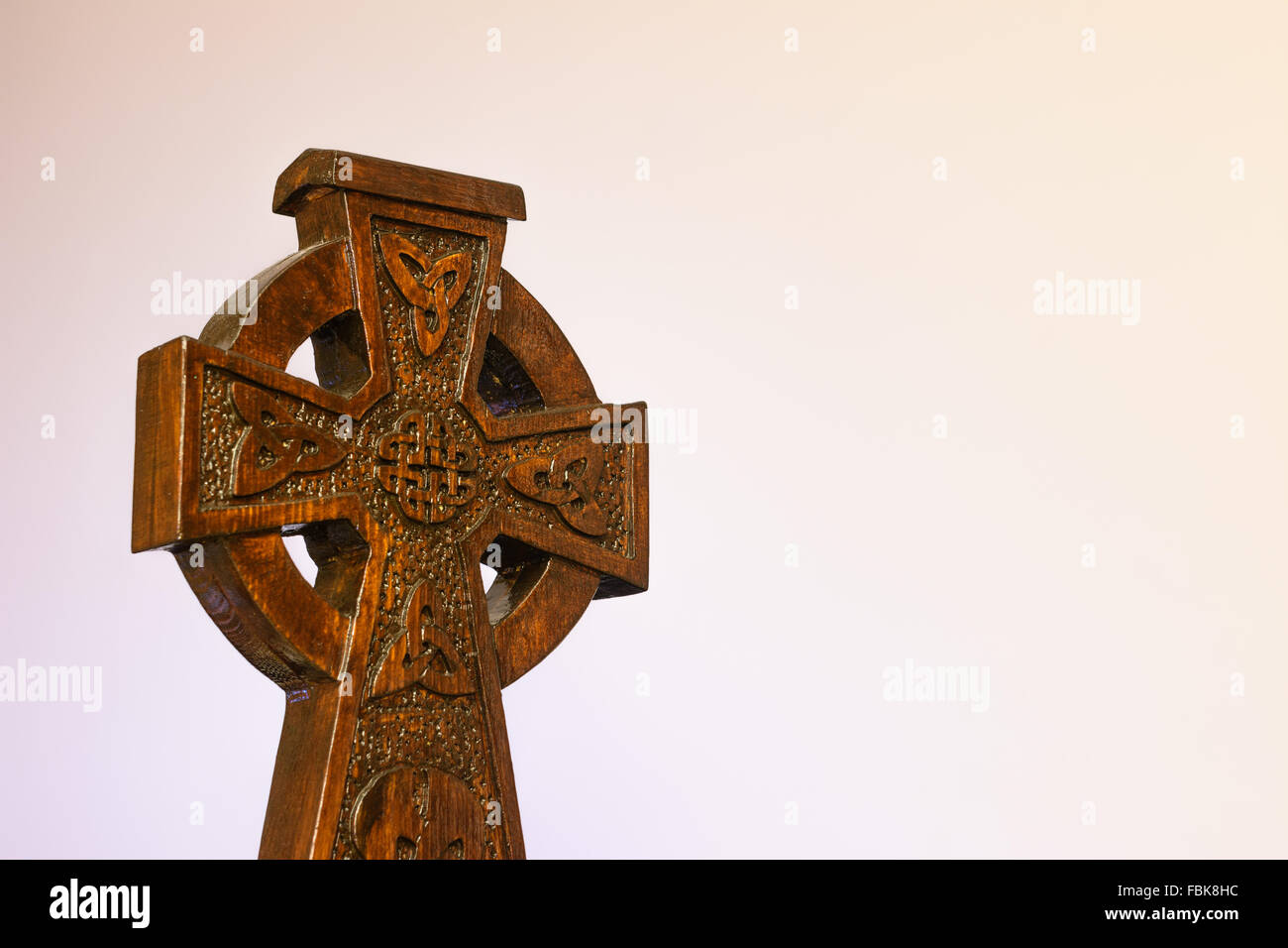 A hand carved Irish Celtic cross. Stock Photo