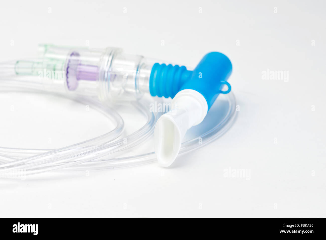Breathing treatment nebulizer mouthpiece with tubing and medication cup