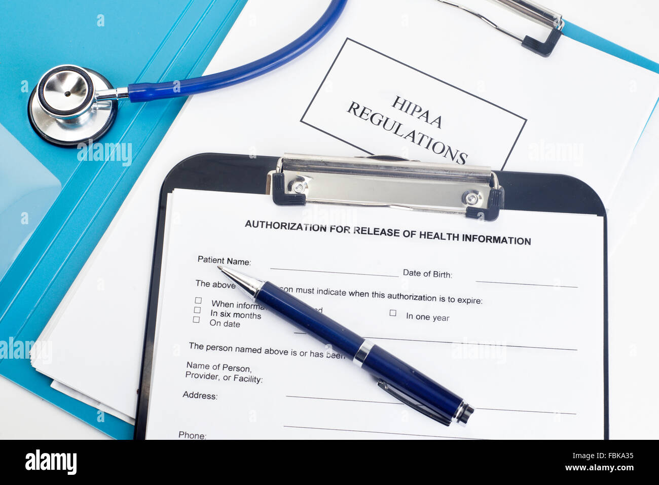 Patient release of information form with HIPAA regulations documents