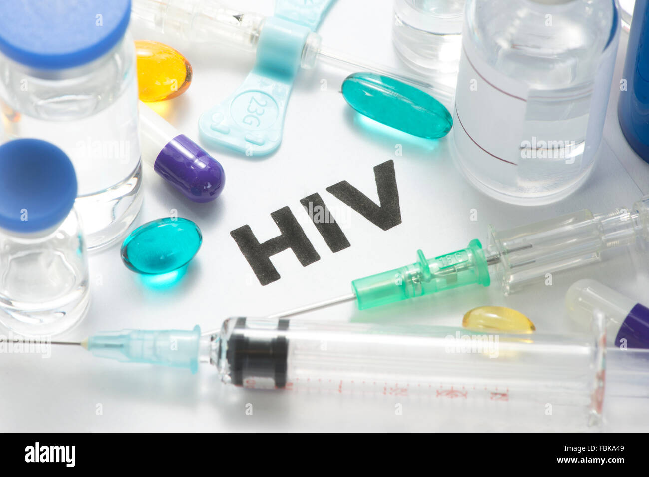 HIV concept photo with syringes, vials, pills, and catheter Stock Photo Alamy