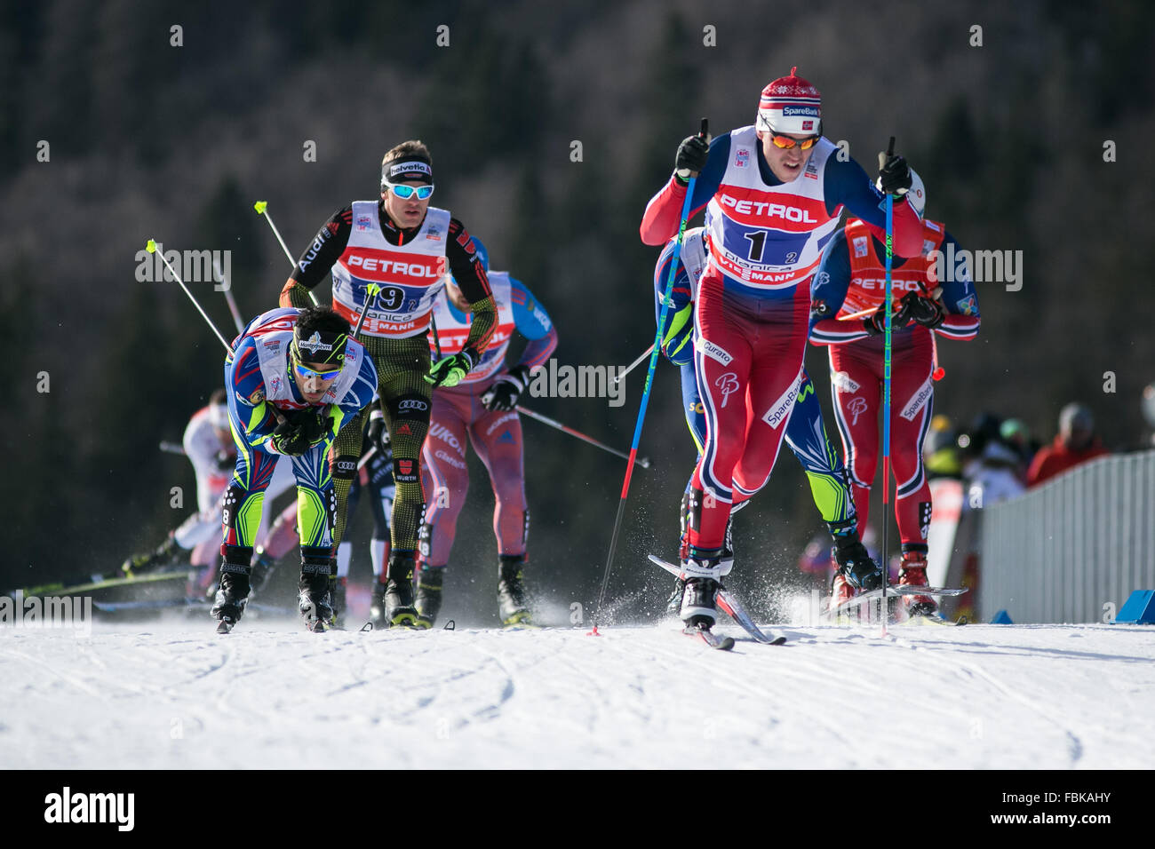 Planica, Slovenia. 17th Jan, 2016. Paal Golberg (R Front) of Norway competes in the FIS Cross-Country World Cup Men's Team Sprint competition final in Planica, Slovenia, on Jan. 17, 2016. The new Nordic Center Planica, home of the largest ski jump in the world and the famous annual venue of the ski jumping finals, hosted its first ever FIS Cross-Country World Cup competition this weekend. Sweden won in ladies' team sprint, and Italy won in men's competition. Credit:  Luka Dakskobler/Xinhua/Alamy Live News Stock Photo