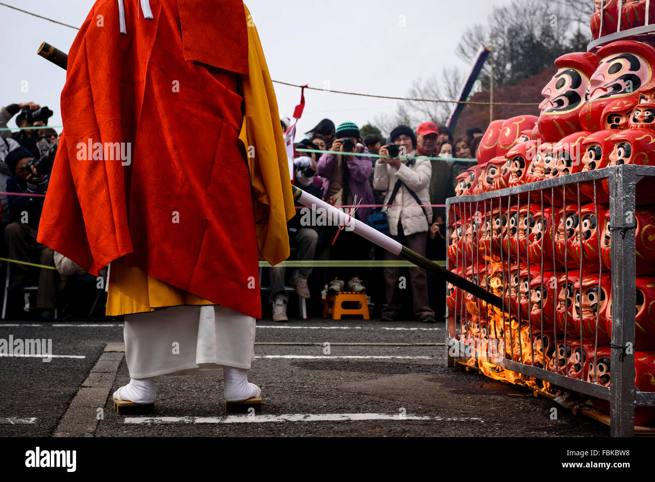 Gifu, Japan. 17th Jan, 2016. A Buddhist monk lights dolls on fire at