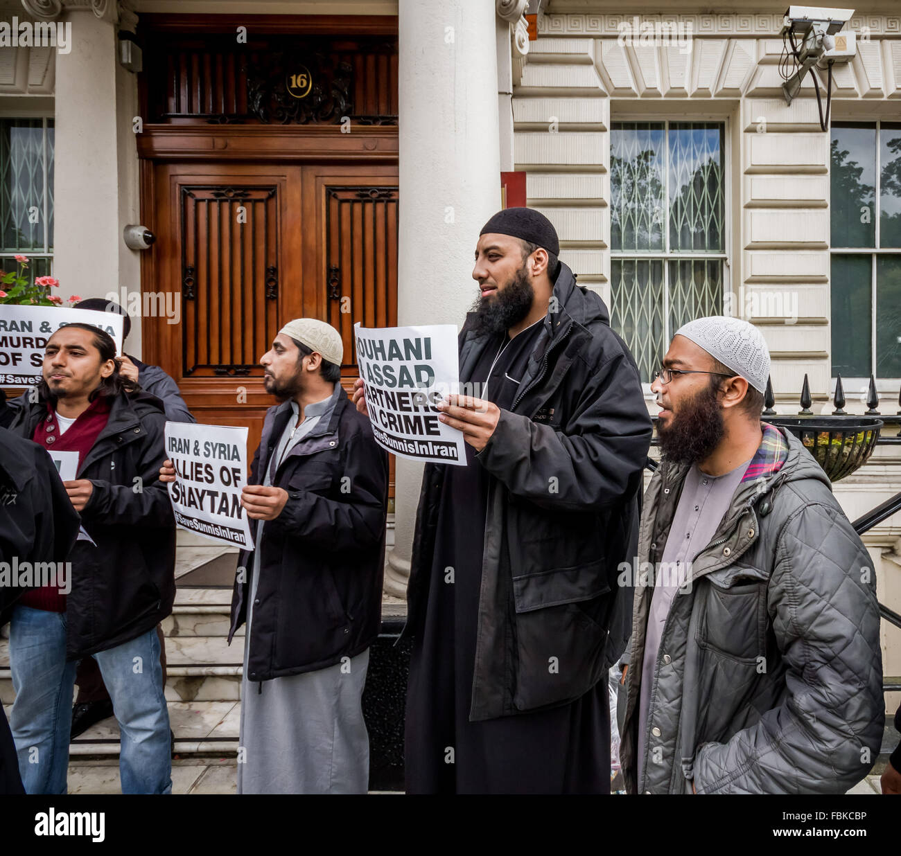FILE IMAGES: London, UK. 18th Sept, 2013. File Images from 18-09-2013: Mohammed Reza Haque (2nd right), 35, known as the ‘Giant’ suspected to be the second British Islamic extremist thought to be among a team of executioners who shot dead five “spies” in Syria early this year. See here in 2013 at an Islamist protest opposite the Iranian Embassy in London Credit:  Guy Corbishley/Alamy Live News Stock Photo