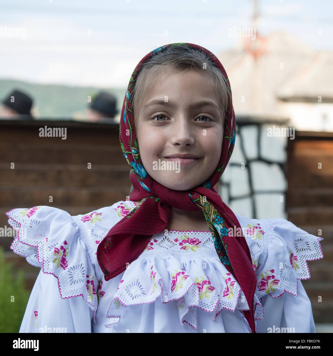 young girl in traditional costume of the district of Maramures, Romania Stock Photo