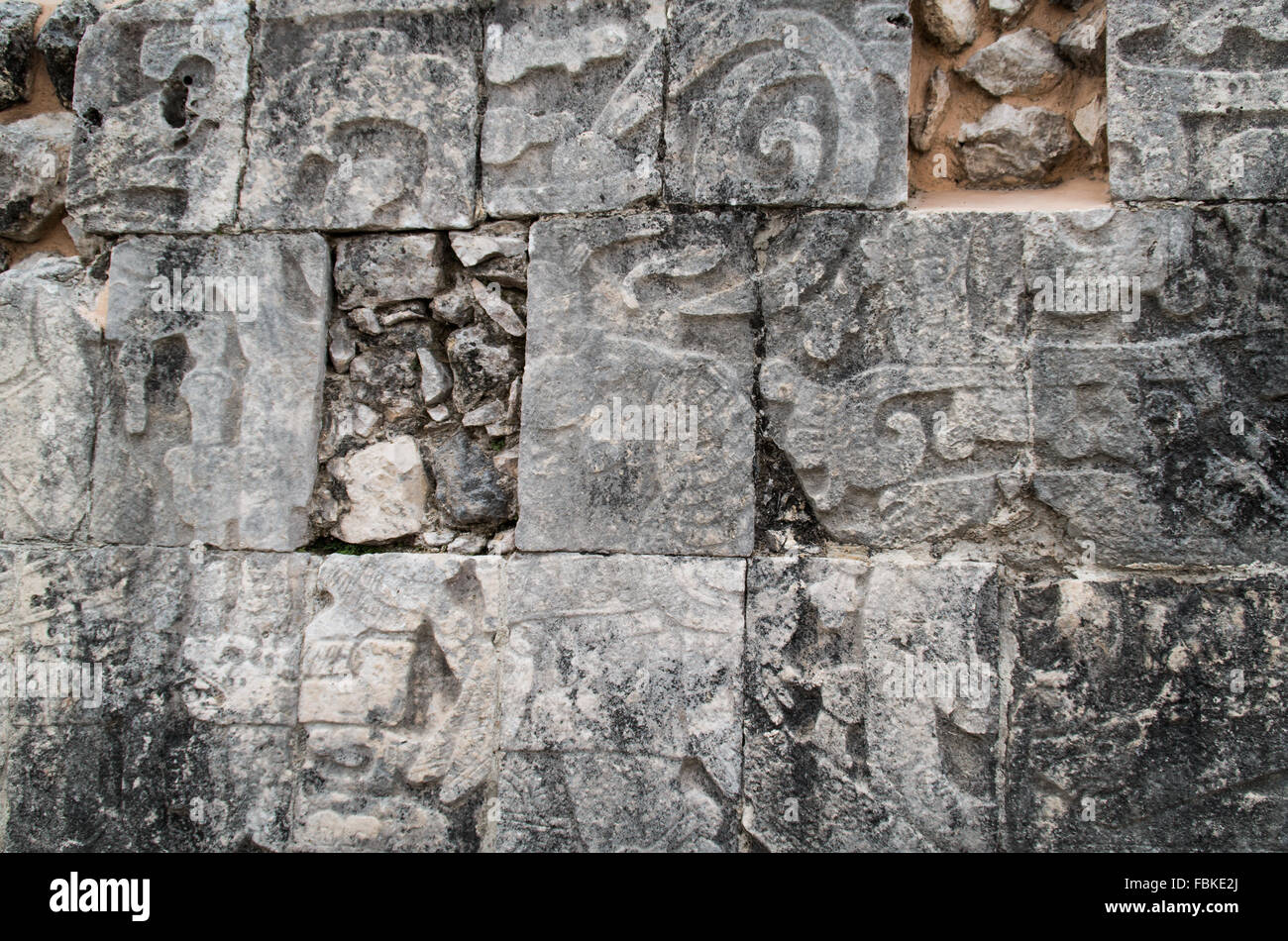 Close up of a portion of a wall mural carving at the Great Ball Court at the Chichen Itza site in Yucatan, Mexico Stock Photo