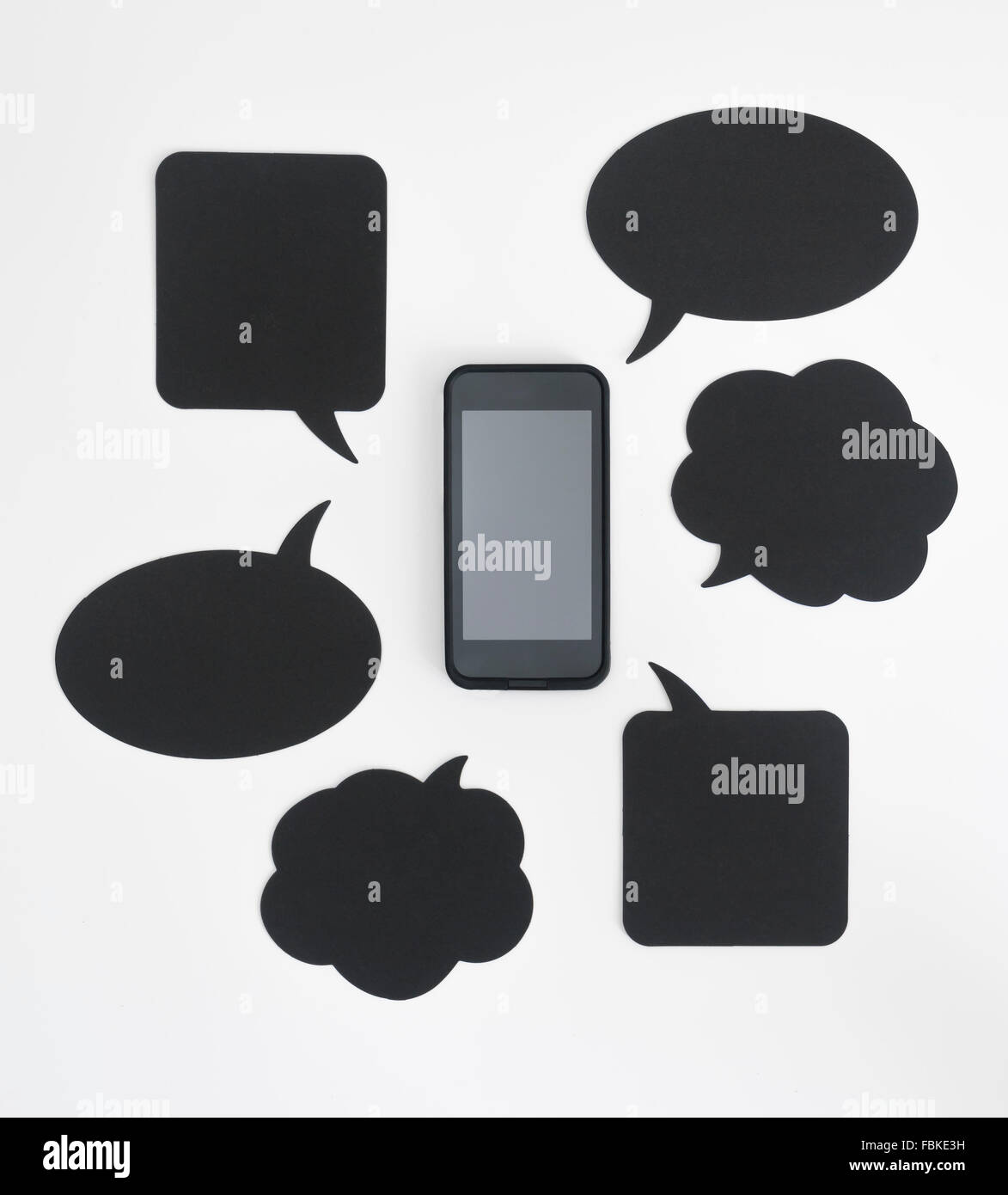 Smartphone and speech bubbles with copyspace Stock Photo