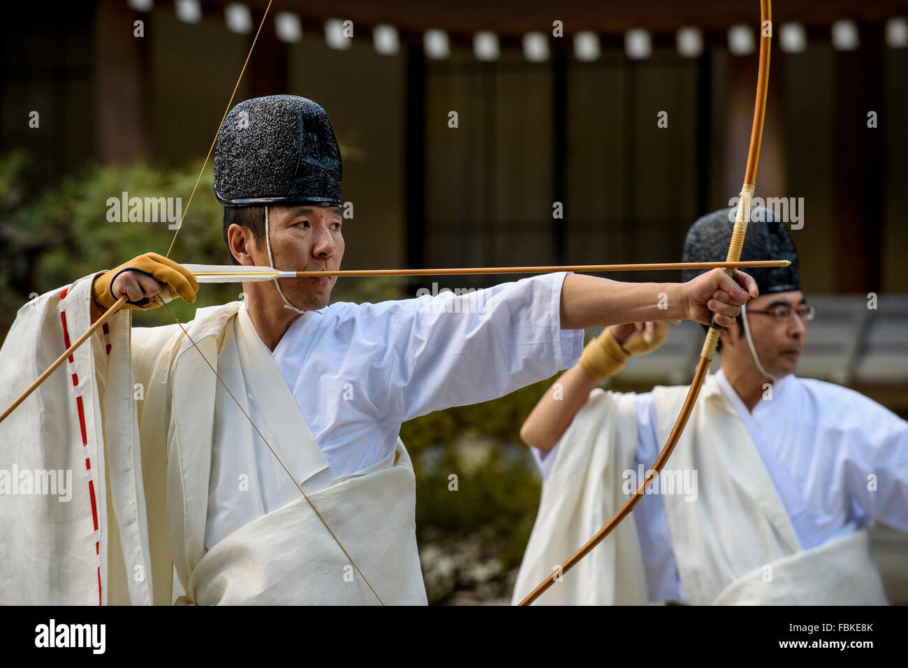 JANUARY 15, 2016 - Shinto priests shoot arrows at a target during the ...