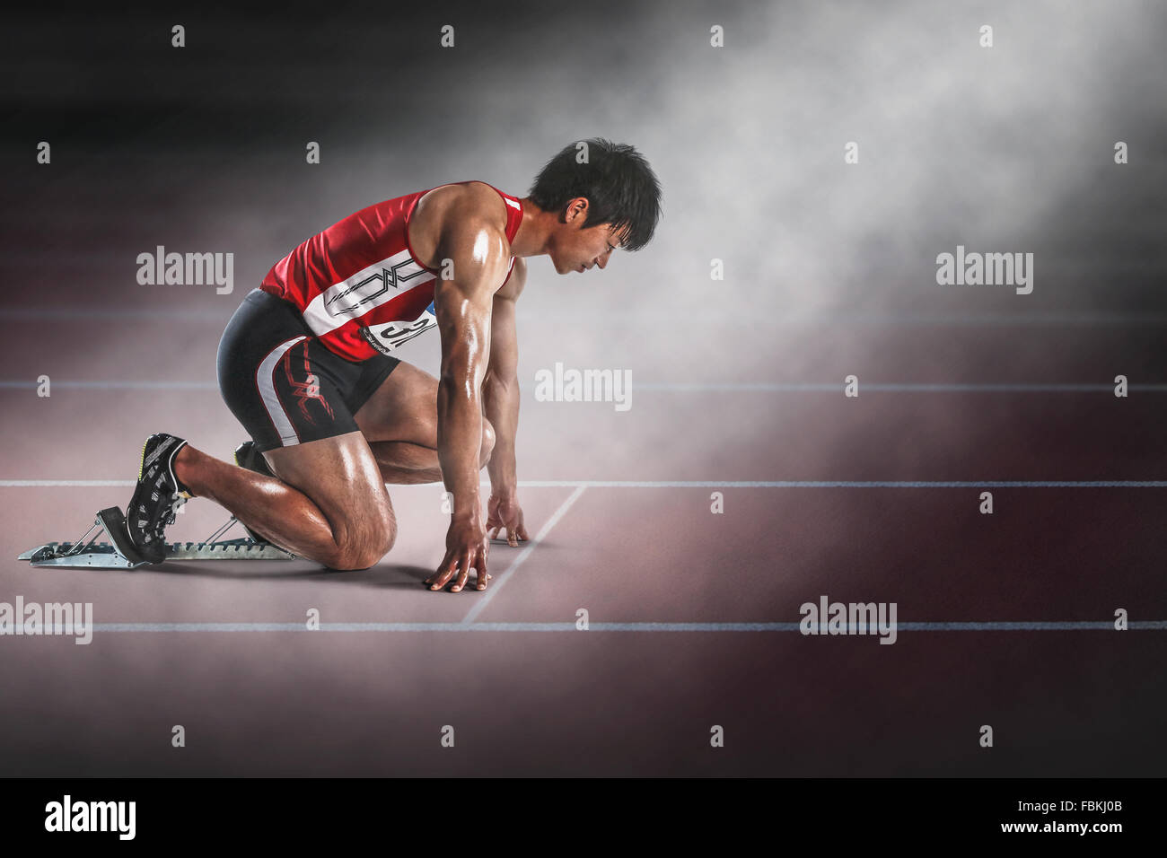 Japanese runner preparing to run Stock Photo Alamy