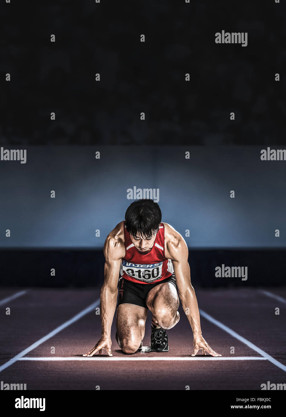 Japanese runner preparing to run Stock Photo Alamy