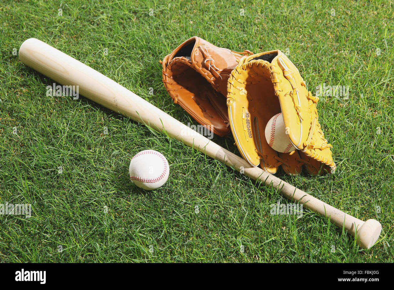 Baseball equipment on grass Stock Photo Alamy