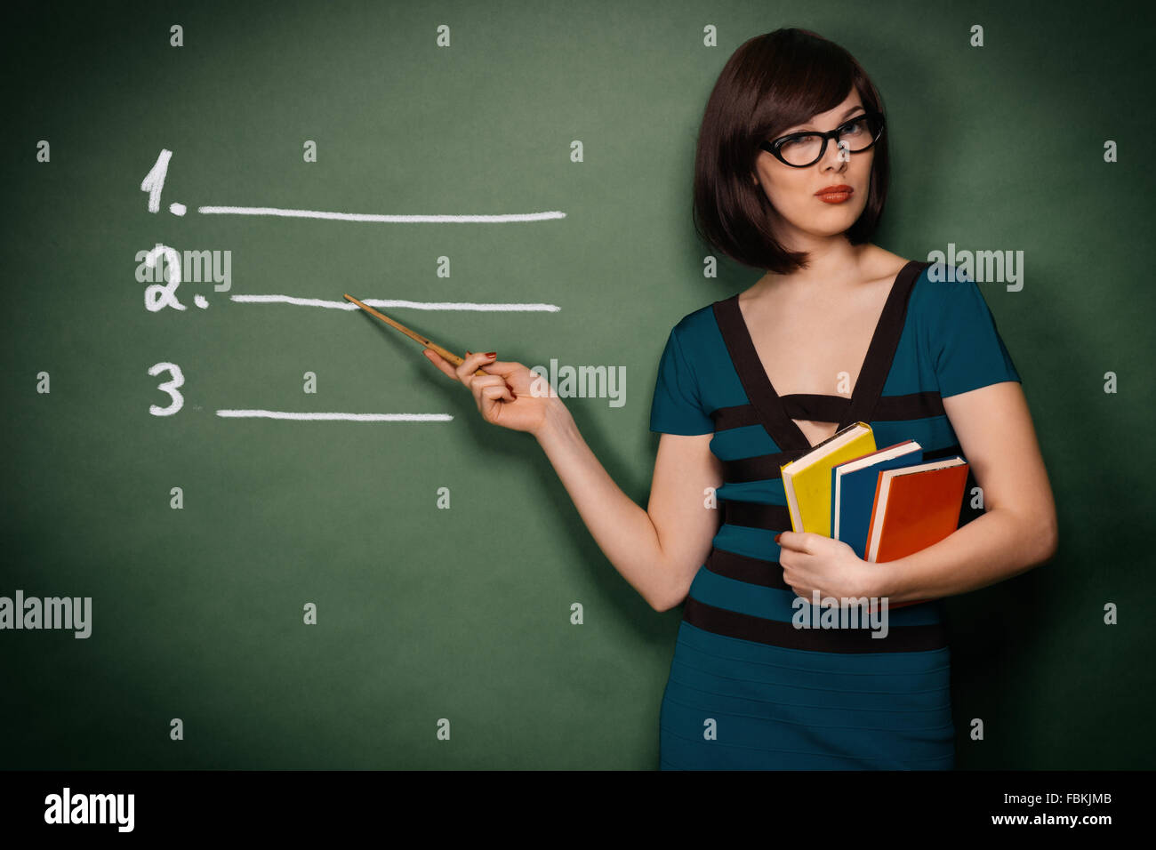 Young teacher with pointer Stock Photo