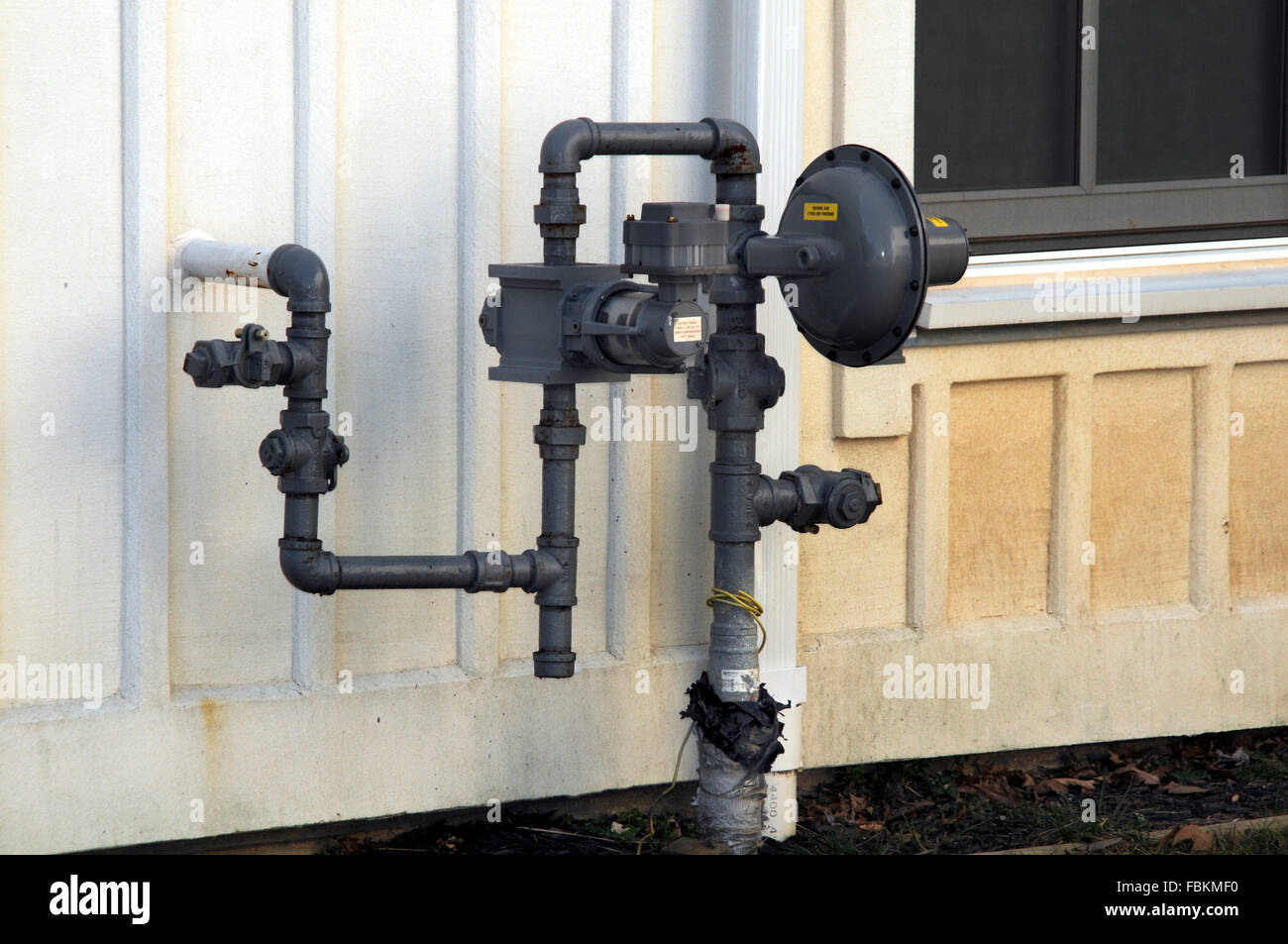 Natural gas line going into a building Stock Photo Alamy