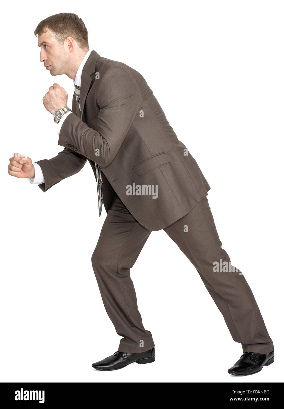 Businessman pulling invisible rope Stock Photo - Alamy