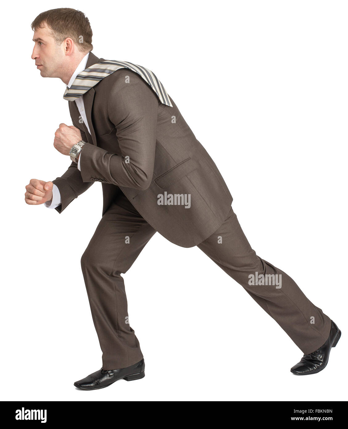 Businessman pulling invisible rope Stock Photo - Alamy