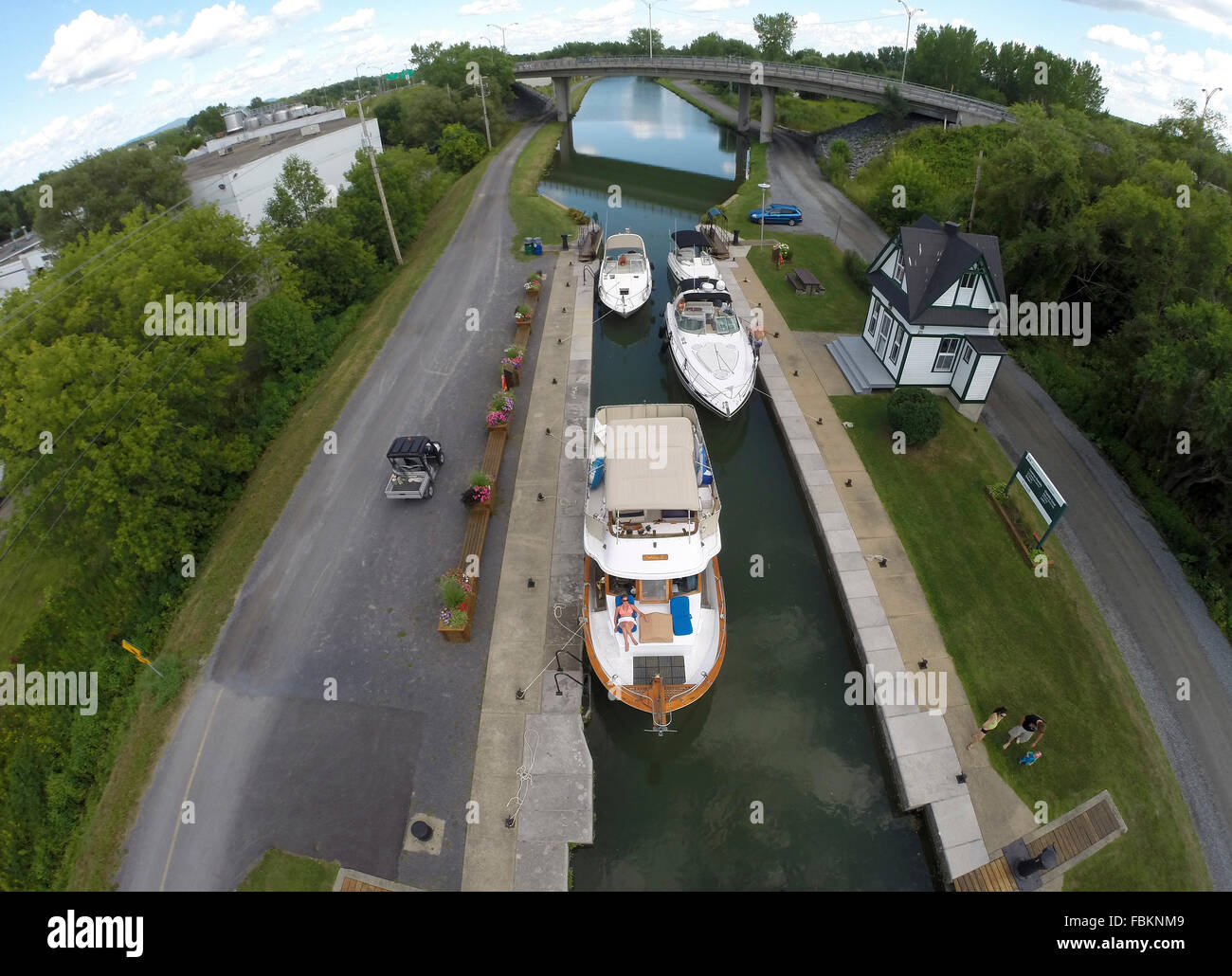 Boats going through the locks on the Canal de Chambly, Québec, Canada. Stock Photo
