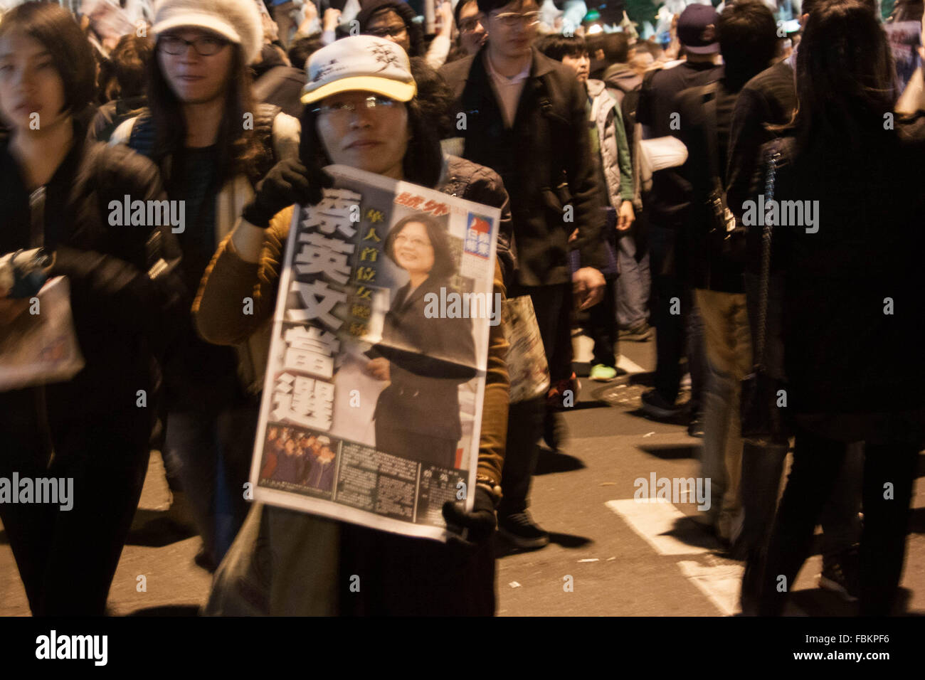 Taipei City, Taiwan. 16th Jan, 2016. Fresh printed Taiwanese News Paper, printed right after the Vote Results to reporting the historical News . Taiwanese People decided turn his back to the actual Party KMT and decide to vote for the opposition Party DPP and write on same time history by election his first female President Miss. Tsai Ing-wen. Tsai won 56.1% of the votes, compared to the 31% that went to Eric Chu from the Kuomintang (KMT) and the 12.8% for third party candidate James Soong from the People First Party (PFP). © Jose Antonio Lopes Amaral/Alamy Live News Stock Photo