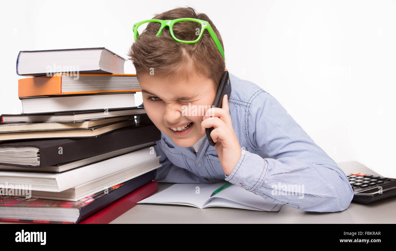 Little business boy talking over mobile phone Stock Photo