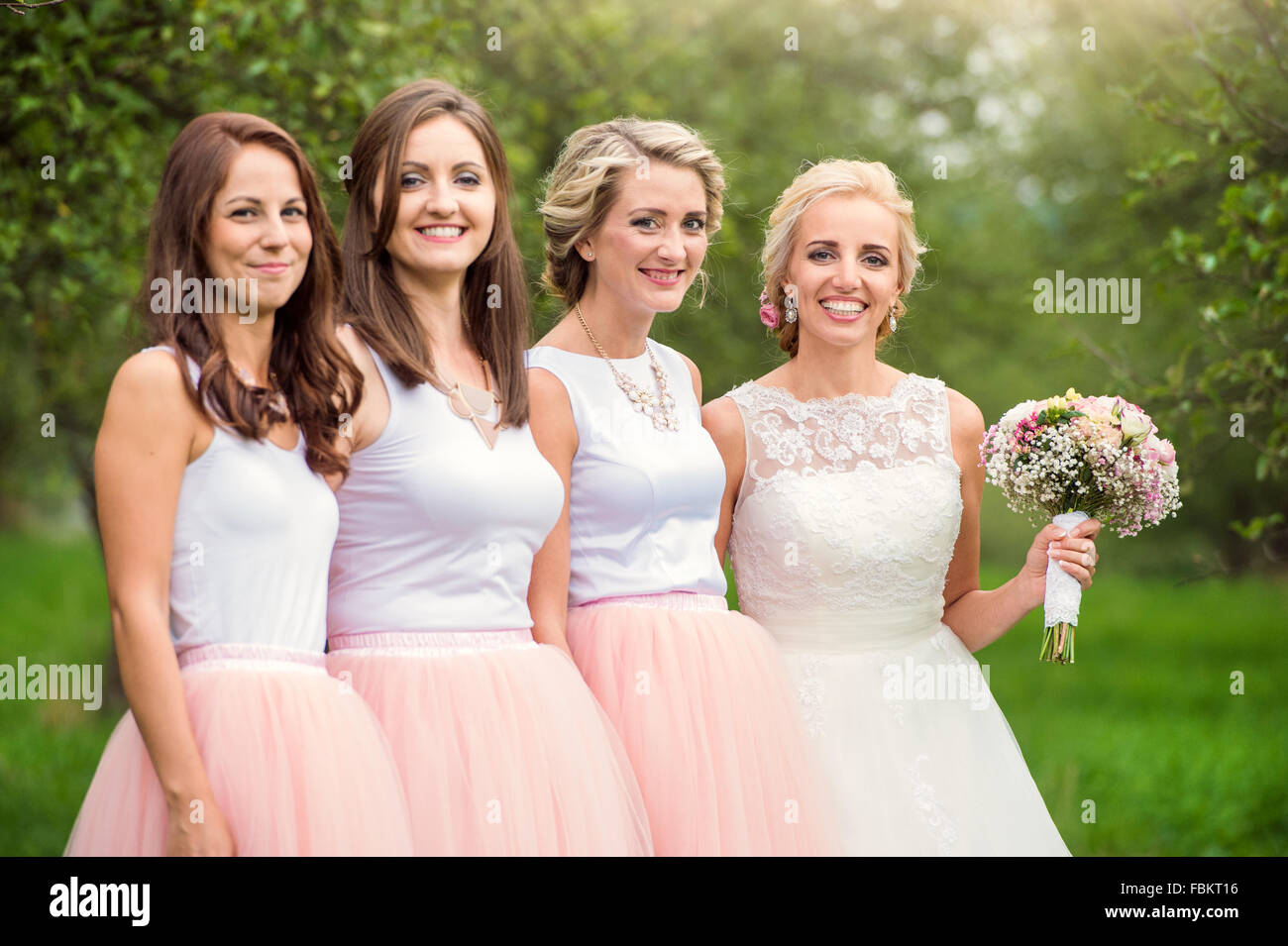 Bride with bridesmaids Stock Photo