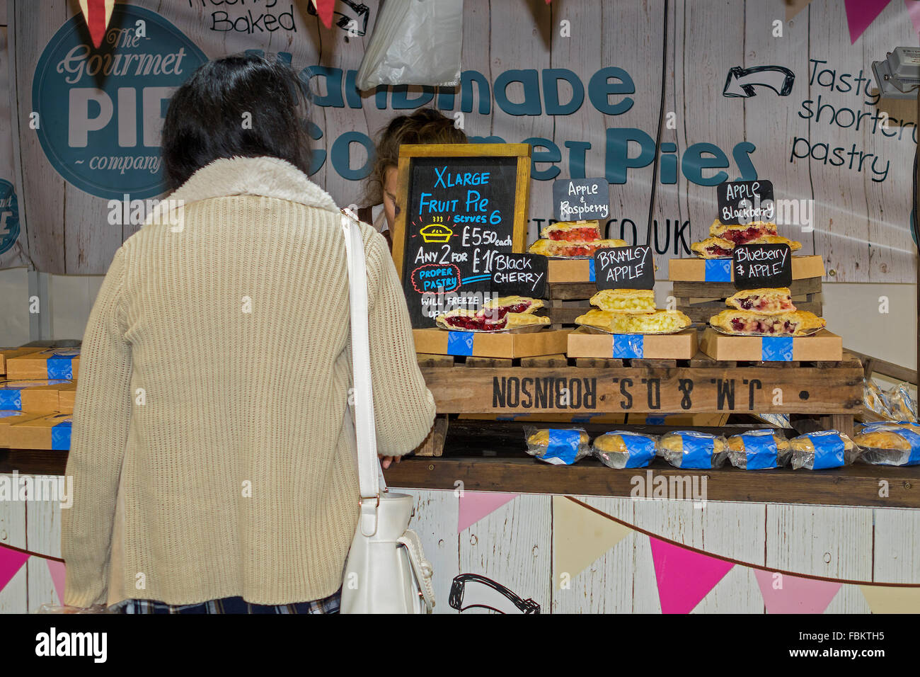 Lady Purchasing A Fruit Pie Berkshire UK Stock Photo