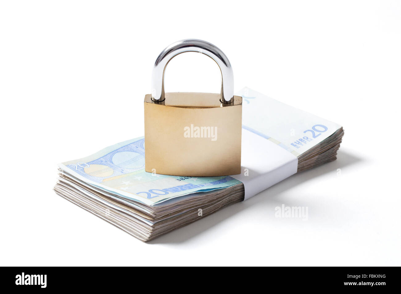 Wad of twenty euros banknotes with locked padlock on it isolated on white background. Image with a clipping path. Stock Photo