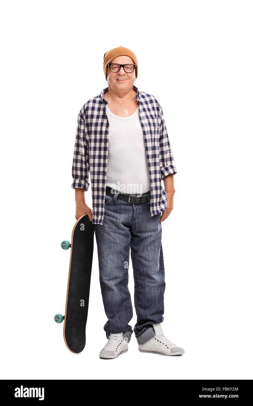 Full length portrait of a cool senior hipster posing with a skateboard isolated on white background Stock Photo