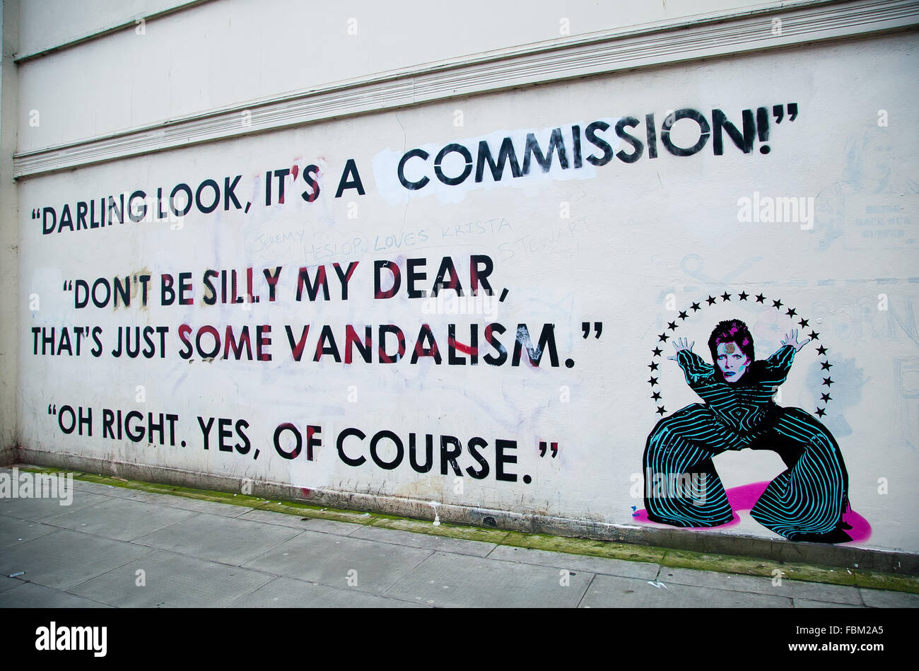 London, UK. 18th Jan, 2016. Pegasus, a street artist pays tribute to David Bowie by painting his portrait on ex-Banksy Slave Labour wall in Wood Green, North London. The artwork appears on Whymark Avenue, on the outside wall of a Poundland shop on High Road. Credit:  Dinendra Haria/Alamy Live News Stock Photo