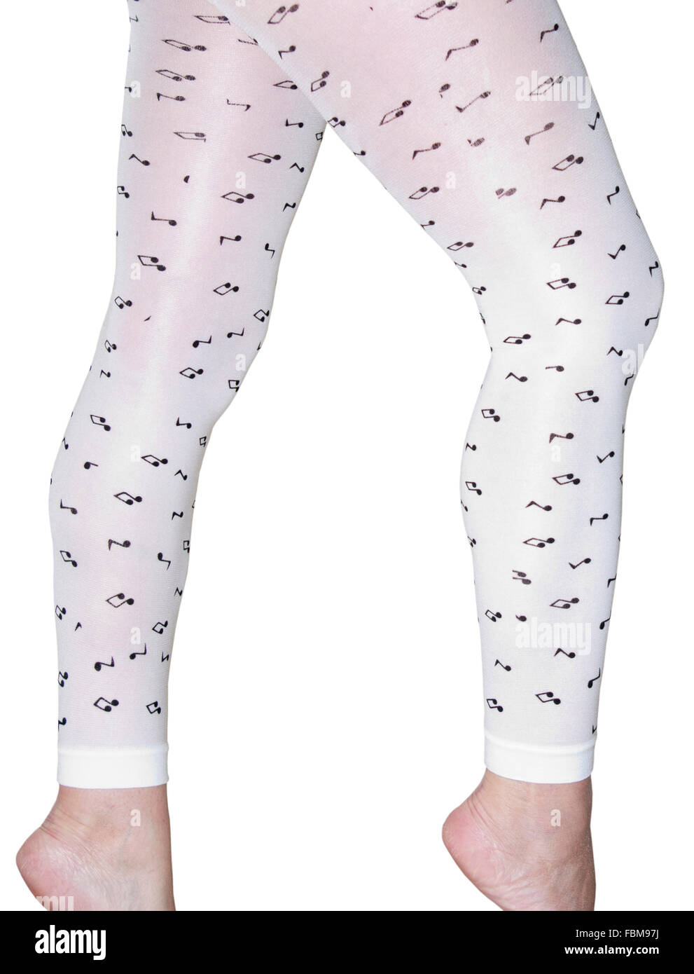 Girls Legs In White Footless Tights With Music Notes Motifs Stock