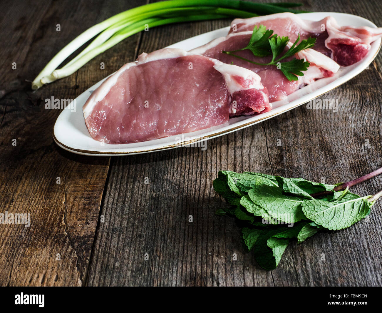 Pork chops on a plate Stock Photo