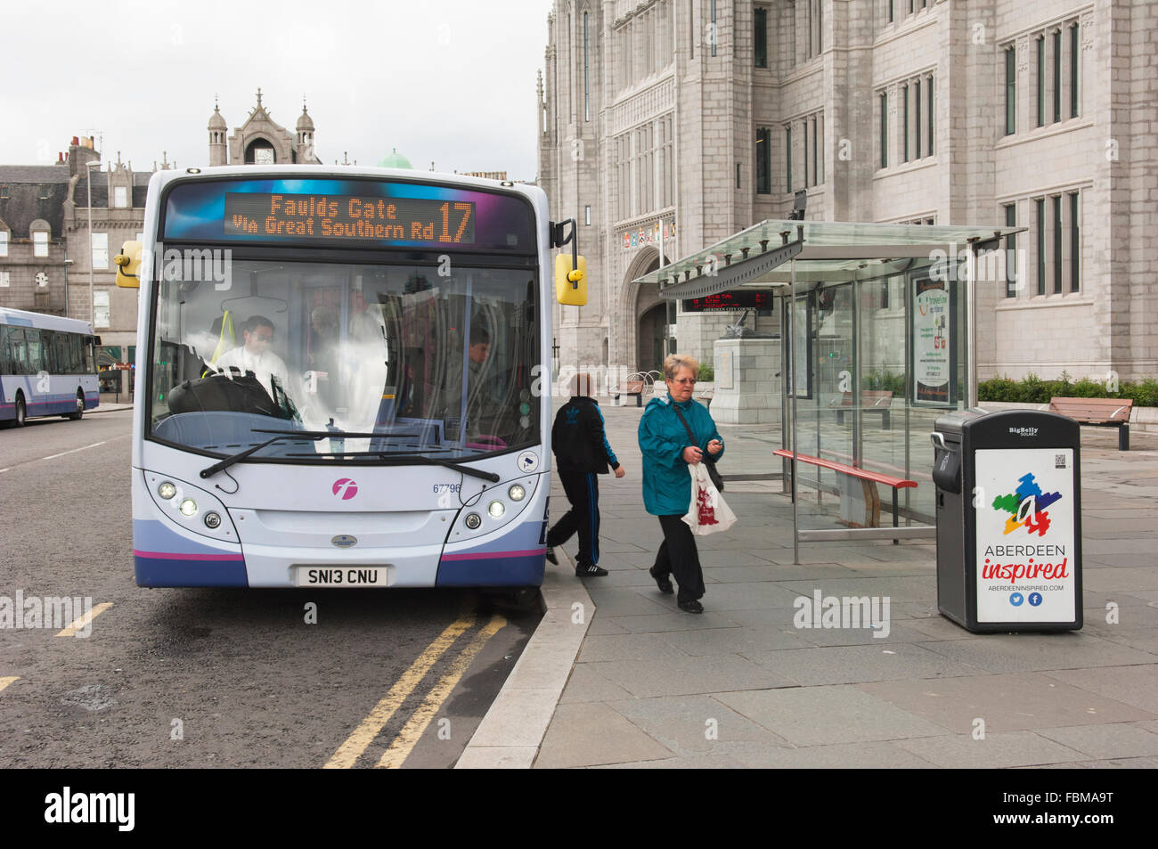 Bus at bus stop in Aberdeen city centre, outside Marischal College