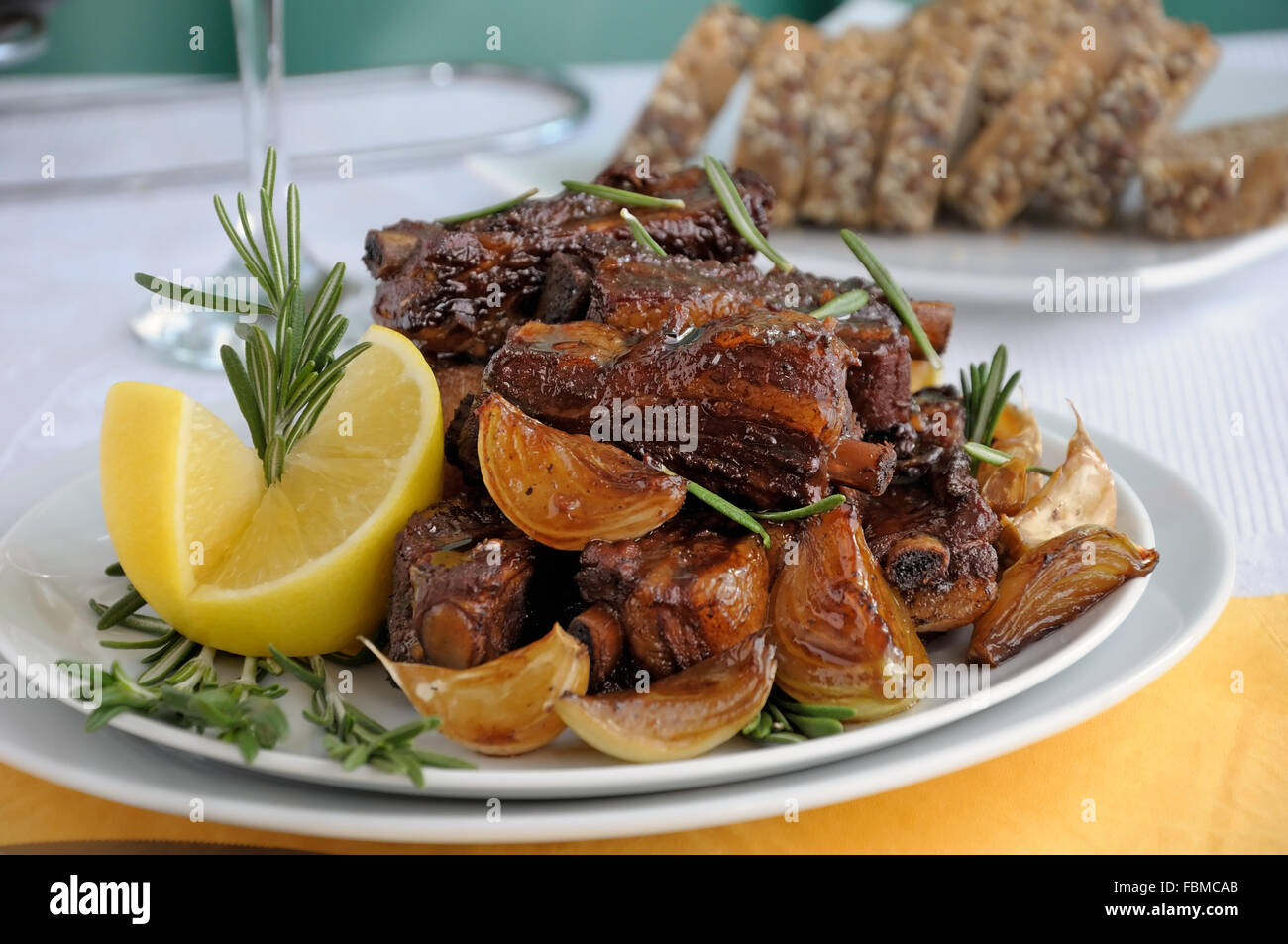 Grilled pork ribs marinated in tea, onion and garlic Stock Photo