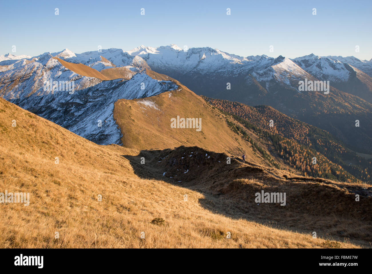 Young Woman hiking in the Alps, Salzburg, Austria Stock Photo