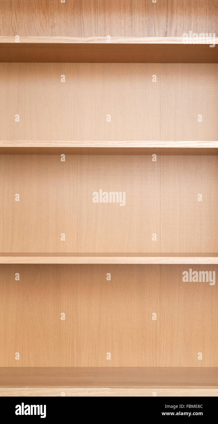 Close-up of shelves of a new empty book-case Stock Photo