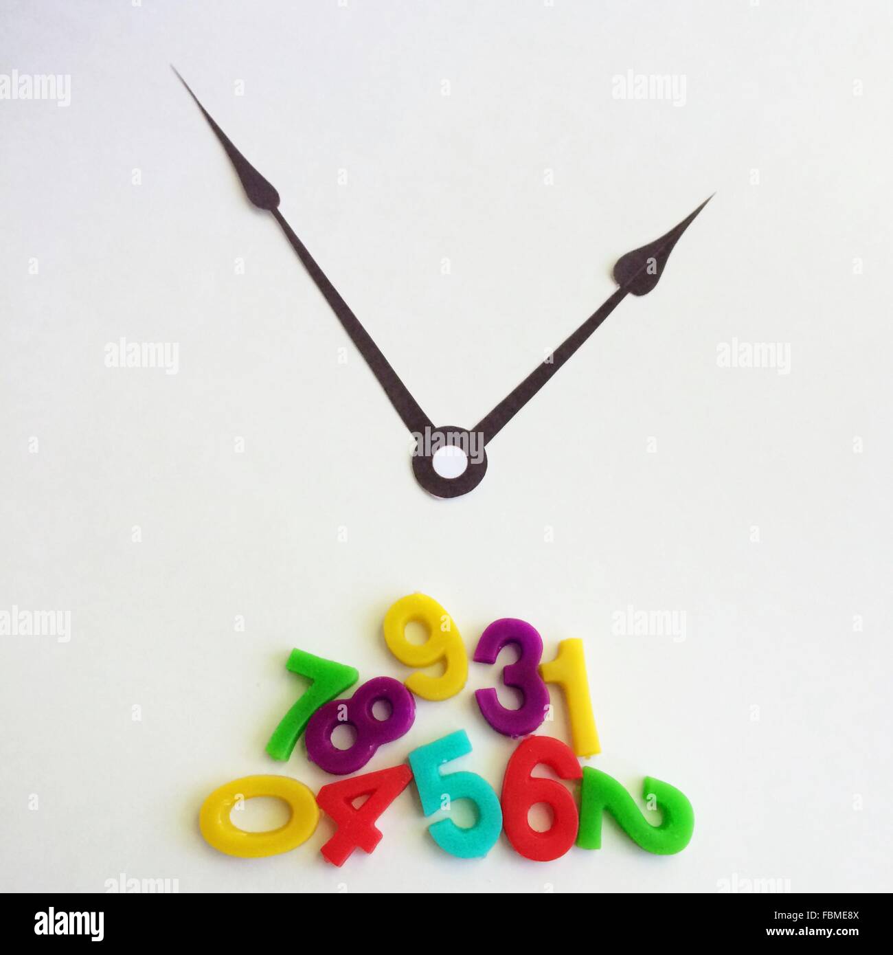 Clock hands with fallen numbers Stock Photo Alamy