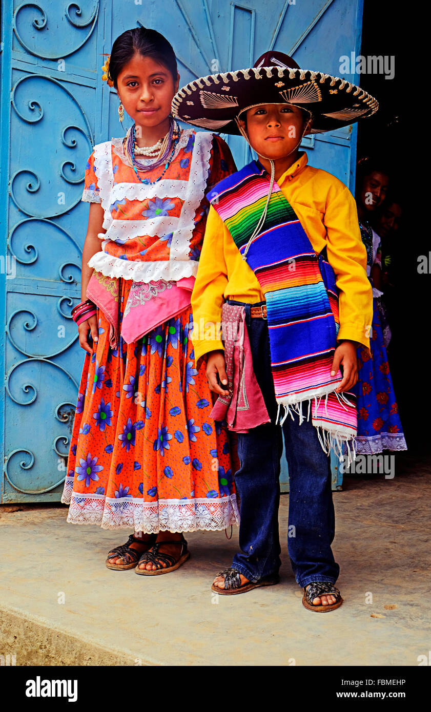 Two young Mexican Fiesta dancers in the tiny mountain Zapotec village of Yagavila Santa Cruz, Oaxaca State Mexico Stock Photo