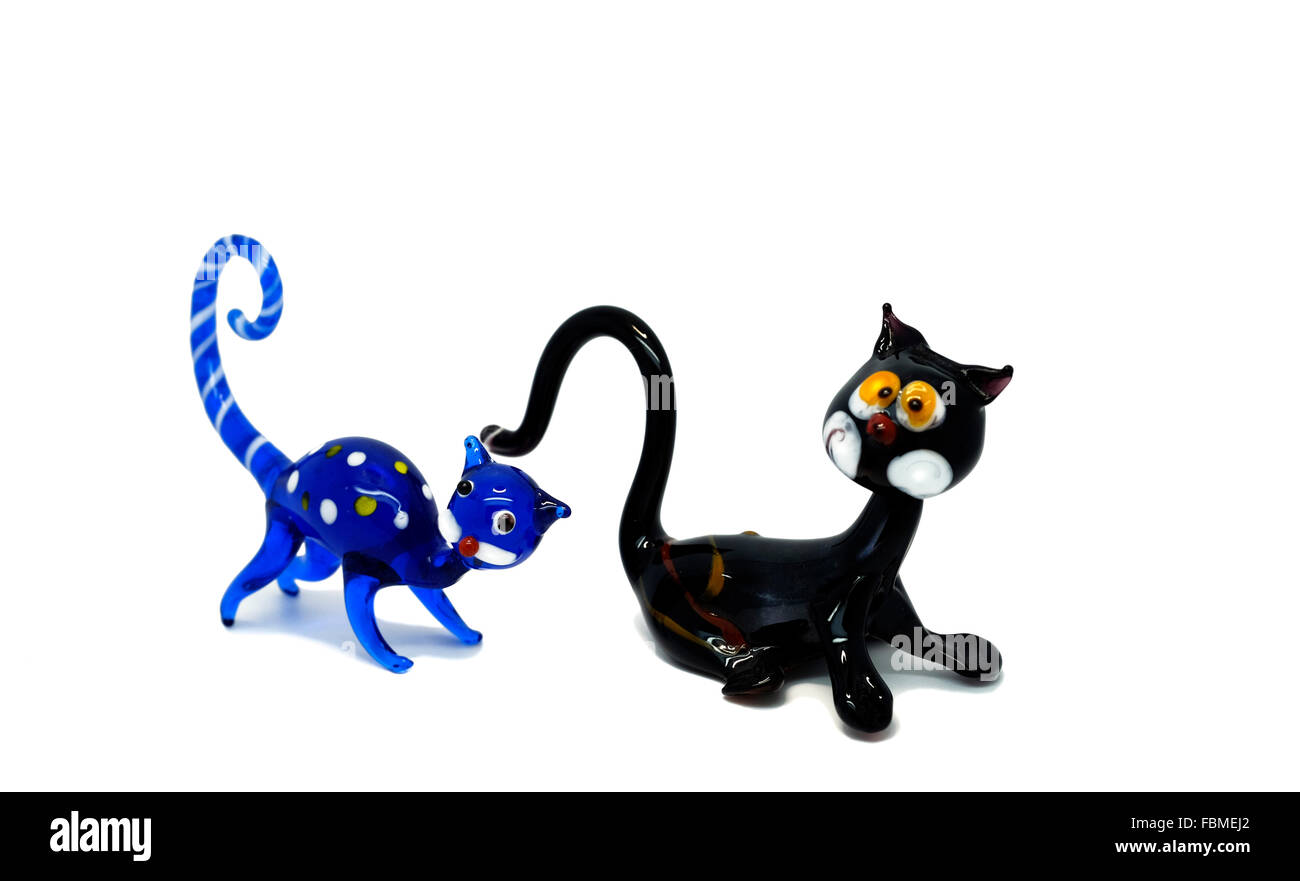 Two colourful colorful Murano glass cat figurines as a cut-out on white Stock Photo