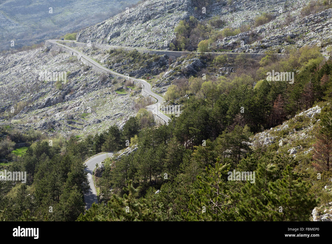 Winding serpentine asphalt road in the mountains of Montenegro Stock Photo