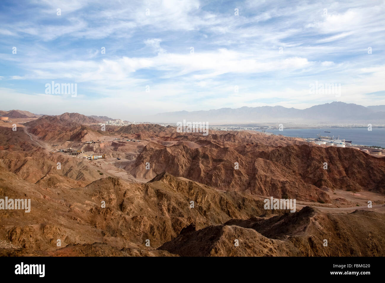 The colourful Eilat mountain range The gulf of Aqaba in the background Stock Photo