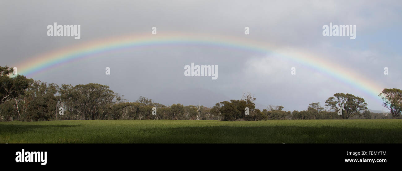 Rainbow over the fields, Stirling Range, Western Australia Stock Photo