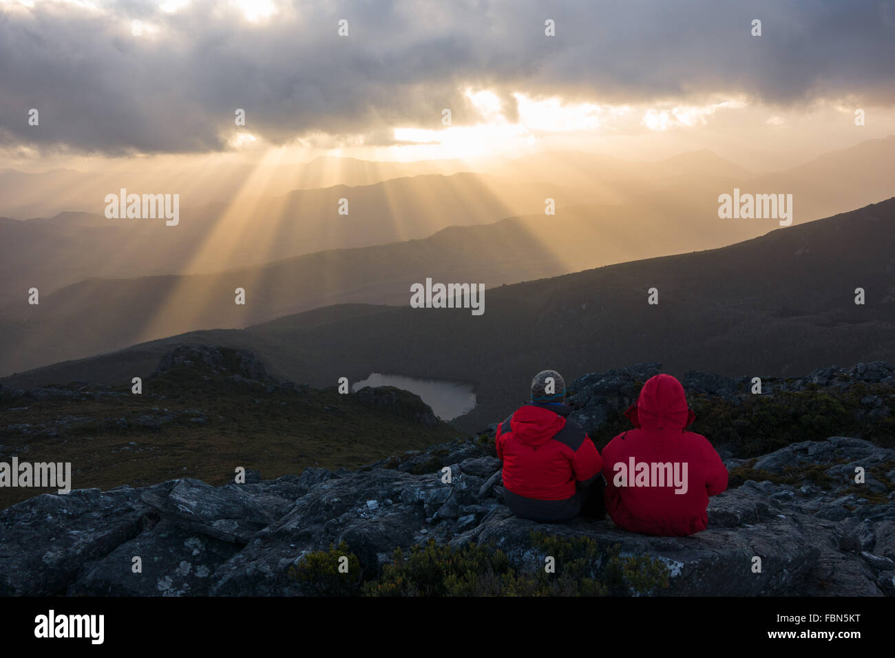Sun beams on hills, Western Arthurs, Tasmania Stock Photo