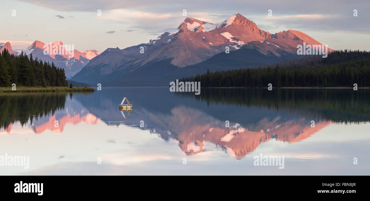 Maligne Lake, one of the jewel of the Canadian Rocky Mountains, by sunset. Jasper National Park, Alberta, Canada. Stock Photo