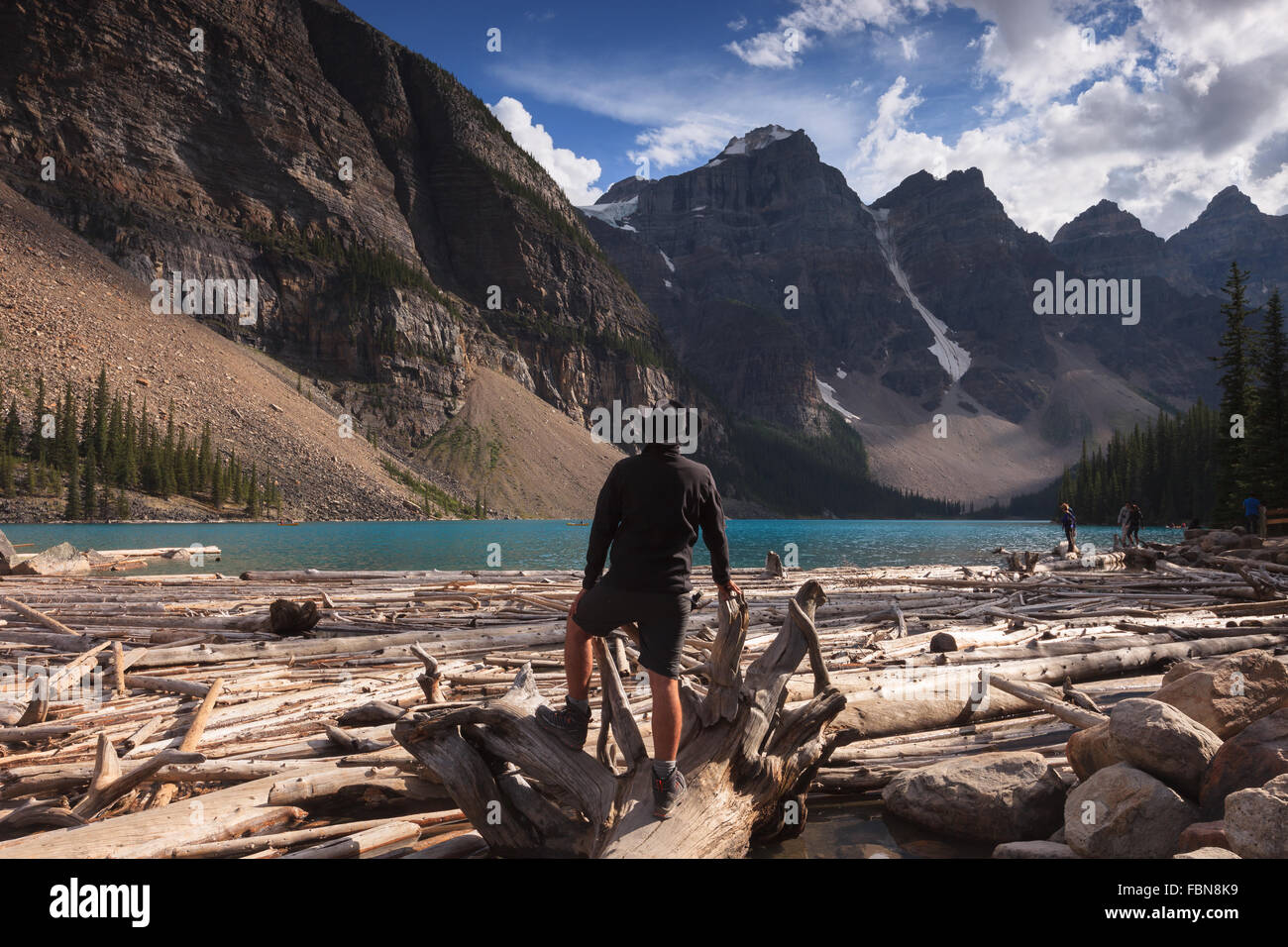 A man enjoying the view of Moraine Lake, Banff National Park, Alberta, Canada, America (Canadian Rocky Mountains). Stock Photo