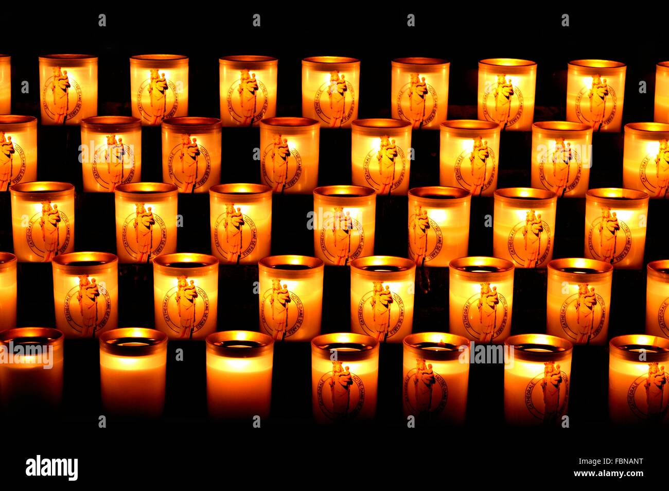 Candles in Notre Dame cathedral Stock Photo - Alamy