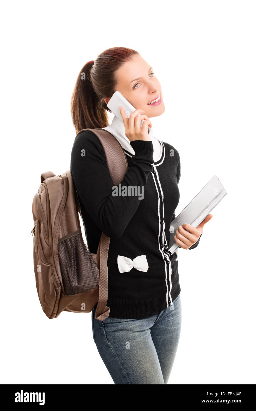 Beautiful smiling young student girl with a backpack, holding books and ...