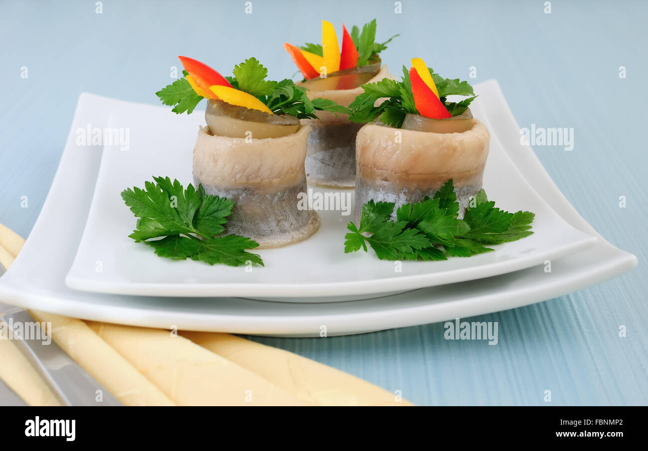 Рулетики из селедки с огурцом