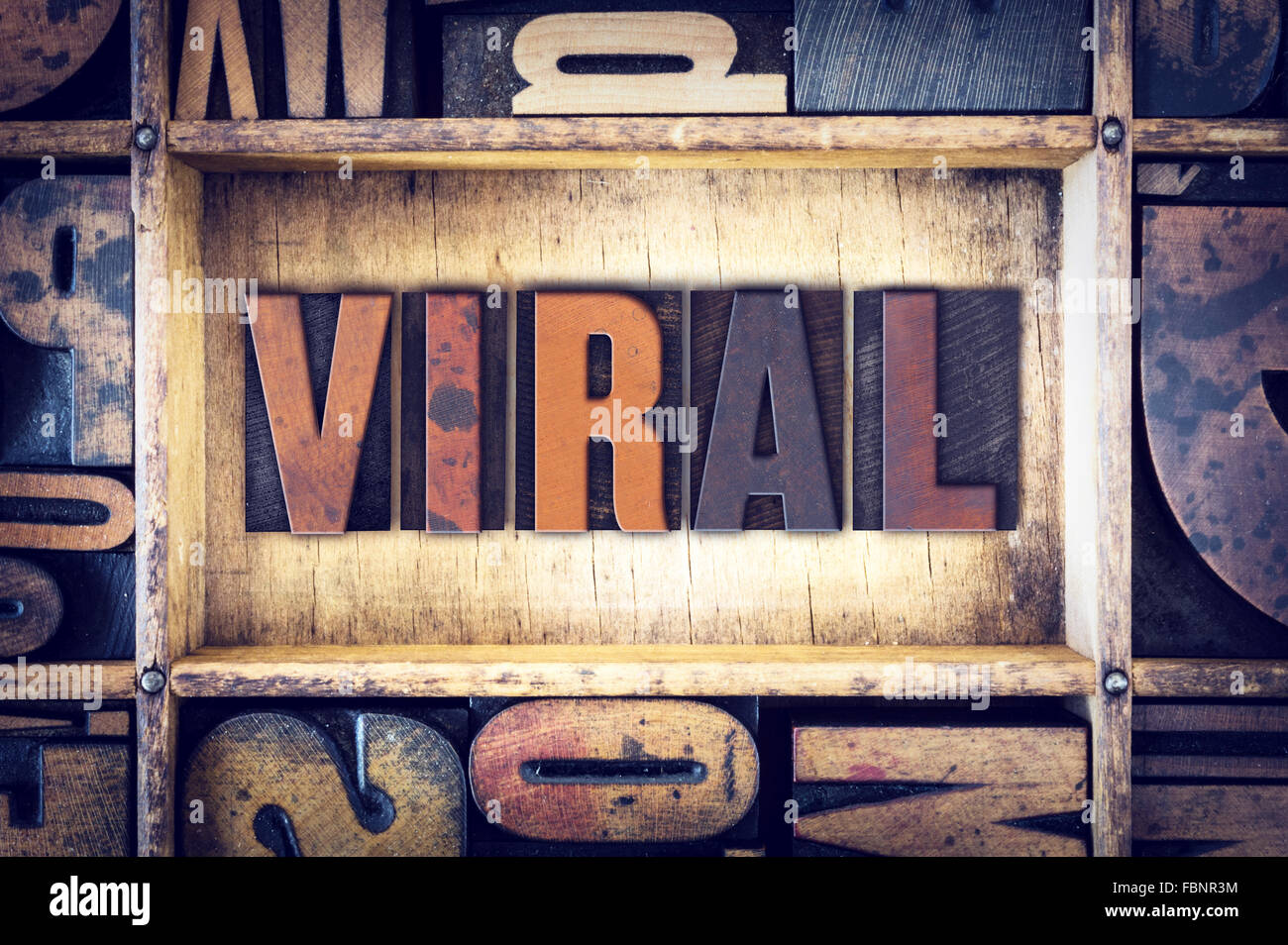 The word "Viral" written in vintage wooden letterpress type. Stock Photo
