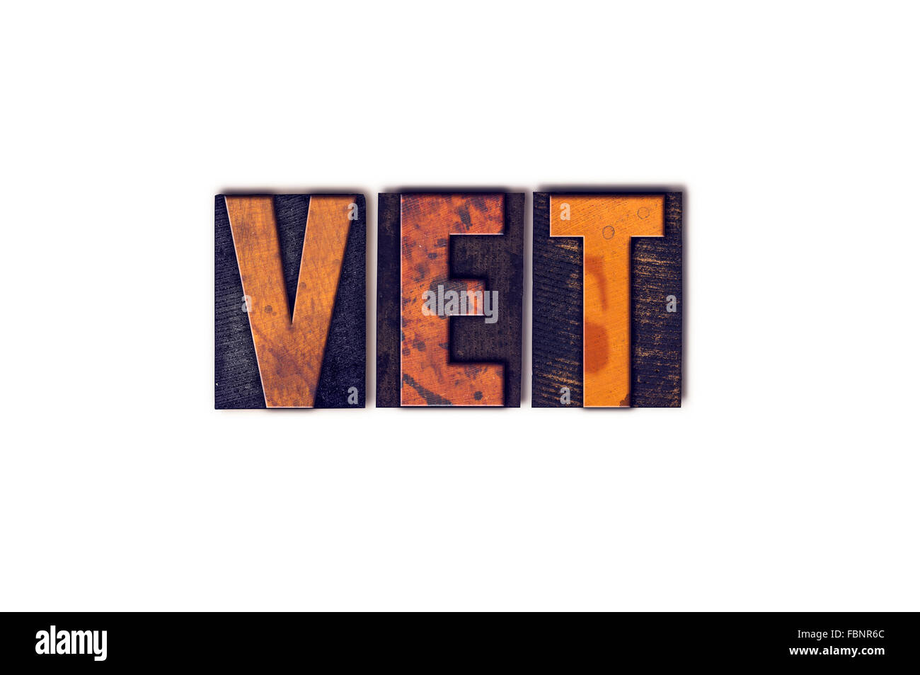 The word "Vet" written in isolated vintage wooden letterpress type on a