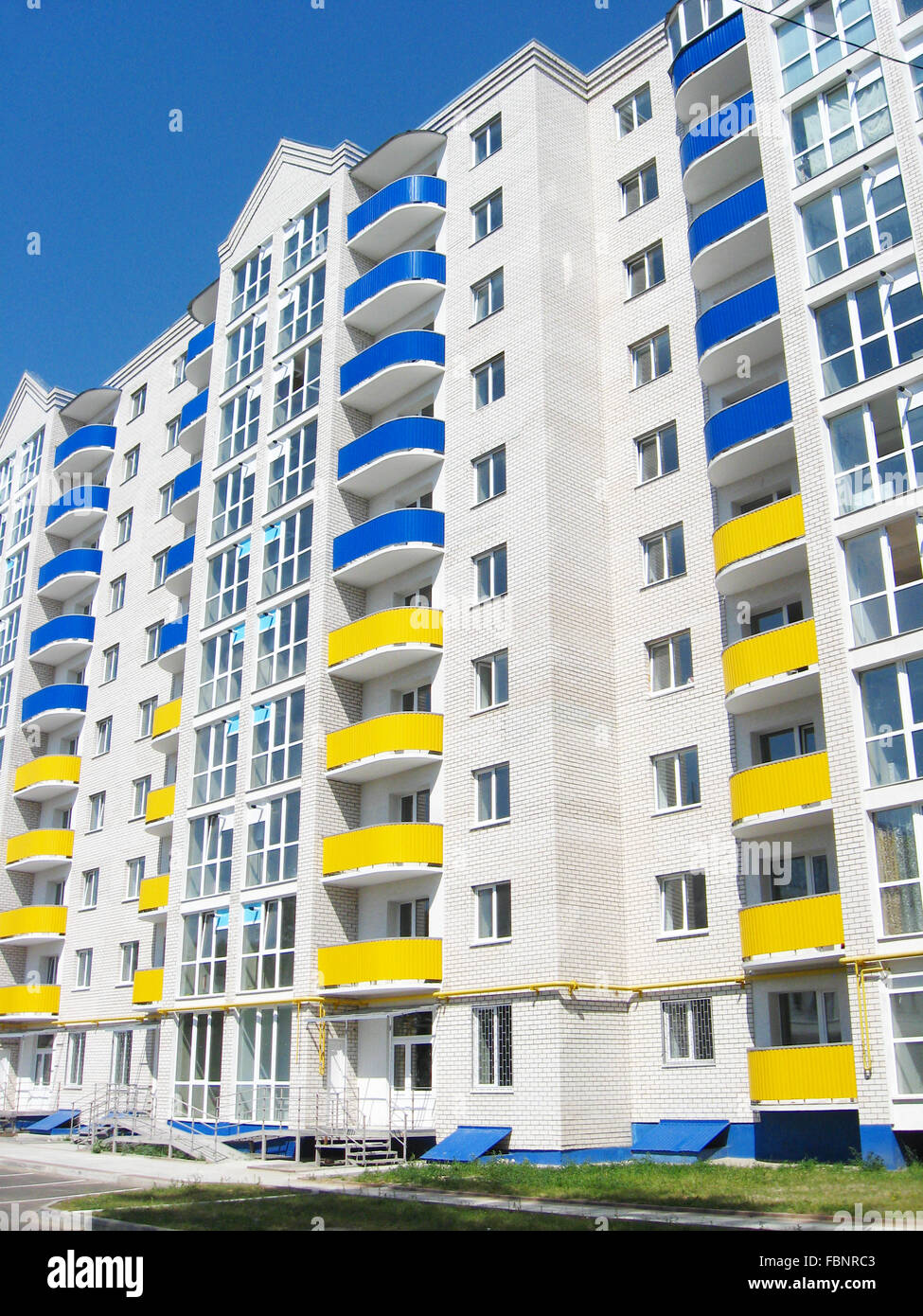 modern skyscraper on the blue sky background Stock Photo - Alamy