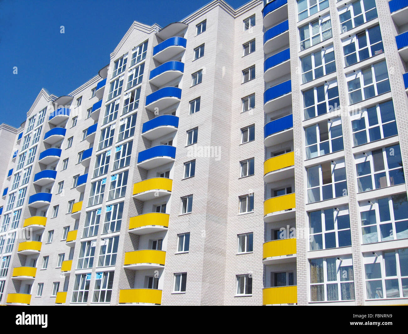 modern skyscraper on the blue sky background Stock Photo - Alamy